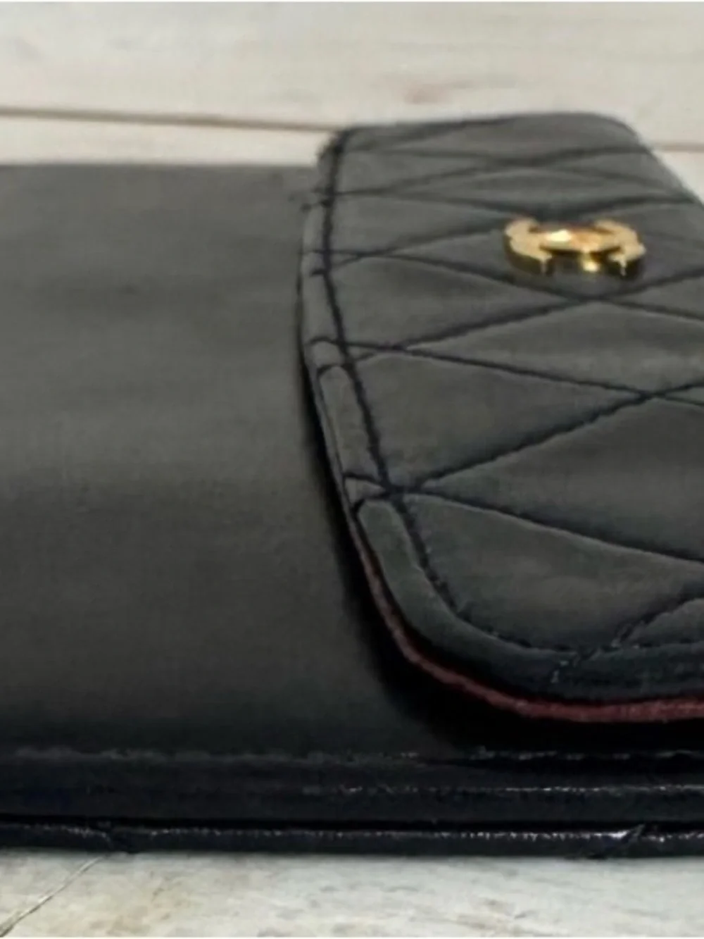 CHANEL Black Quilted Leather Wristlet with Gold CC Emblem